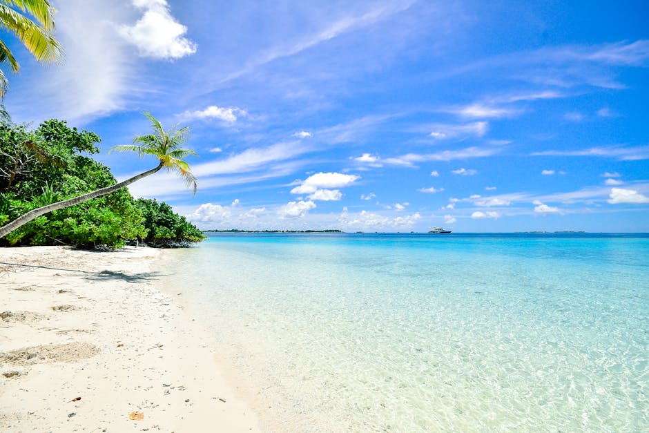 Stunning beach in Laamu Atoll, Maldives, with turquoise waters and clear skies
